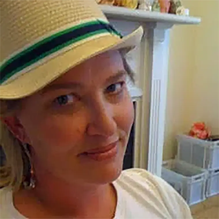 Bridget Croft wearing a straw hat
